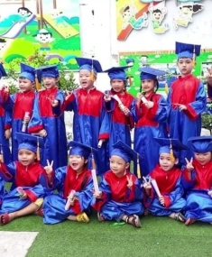 ÁO TỐT NGHIỆP TIỂU HỌC TẠI BÌNH DƯƠNG